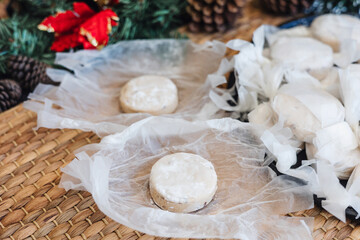 Traditional Christmas polvorones, nevaditos, mantecados or sweet cookies on plate for holidays