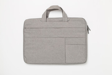 Grey stylish laptop bag on color background,top view