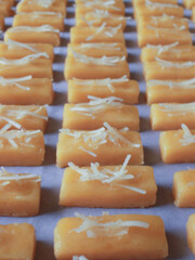 The delicious and tempting Castengle cake is placed patiently in front of the oven door, ready to begin its journey of transformation into alluring and fragrant deliciousness. 