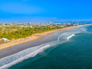 Aerial view of Seminyak beach coastline. The famous and luxury Kuta beach resort in southern Bali,...
