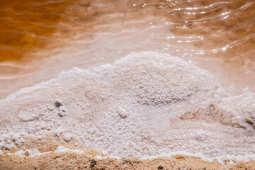 Fototapeta na wymiar Salt in an evaporation pit at the Chott el Djerid dry salt lake.