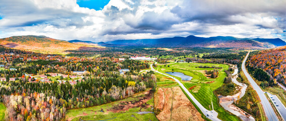 Aerial panorama of Presidential Range covered in clouds, in Bretton Woods, White Mountain National Forest, New Hampshire, along highway 302. - Powered by Adobe