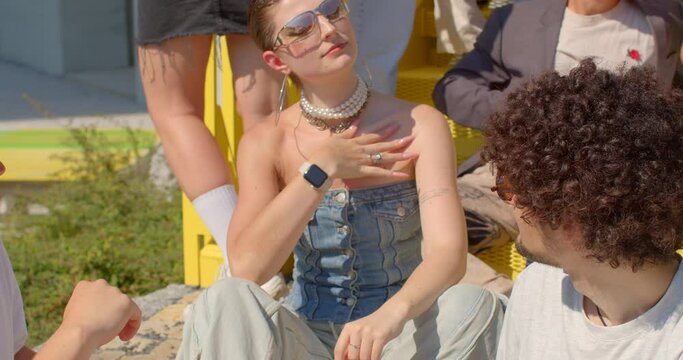 involve consensually and openly loving and connecting with multiple partners simultaneously Girl and two guys talking. Romantic relationships among three individuals polyamory