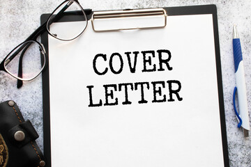 Notepad with the inscription COVER LETTER. Business letter text concept with cover letter text.