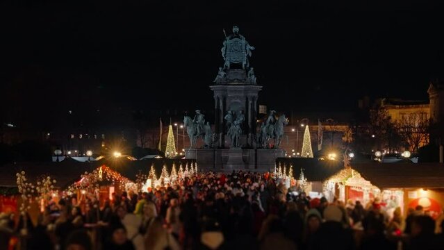Winter Holiday Christmas Village Market Lit Up At Night on Maria-Theresien-Platz in Vienna, Austria