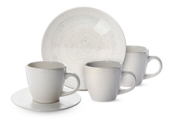 Clean plate, cups and saucer on white background