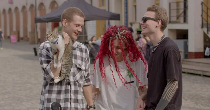 She brings joy to communication. Attempting to Create Balance situation there's a conflict of interests between two guys, the girl might be trying to balance the situation and avoid misunderstandings