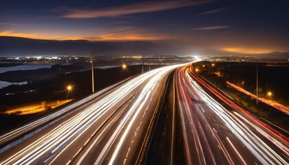 Long exposure photo of highway at night - light trails, road scene