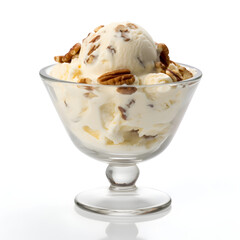 Butter Pecan ice cream in a glass bowl isolated on a white background 