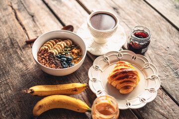 Smoothies, fruit with croissants and drinks