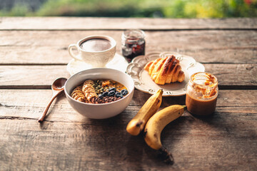 Smoothies, fruit with croissants and drinks