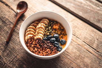 Smoothie bowl with fruit toppings