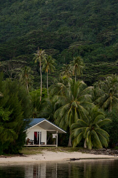 Small house church on the hillside beach in green tropical island
