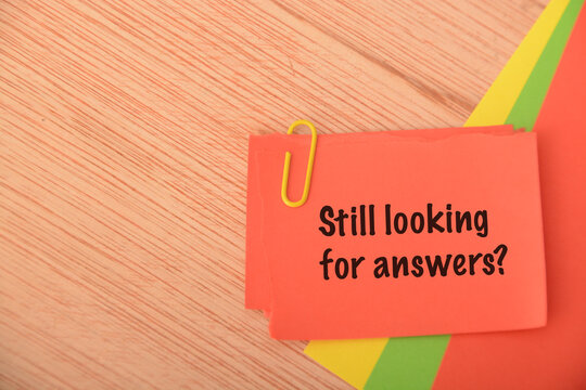Red paper written with STILL LOOKING FOR ANSWERS?