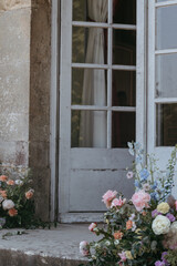 Fototapeta na wymiar Luxury floral arrangements at a wedding in entrance