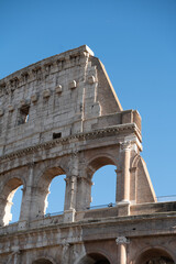 Fototapeta premium Exterior Panorama of the Roman Colosseum on a sunny day in Rome, Italy