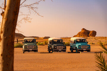 Fototapeta na wymiar Hegra Vintage Land Rover Tour in Summer, AlUla, Saudi Arabia.