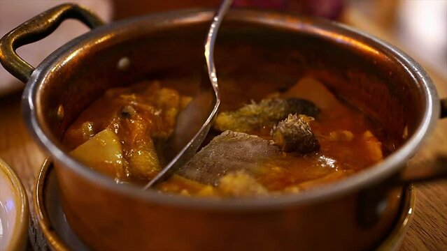 Very slow cooked stew of Bacalao (dried cod) confit in extra virgin olive oil