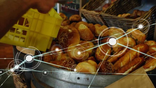 Animation of network of connections over caucasian man picking bread in bakery