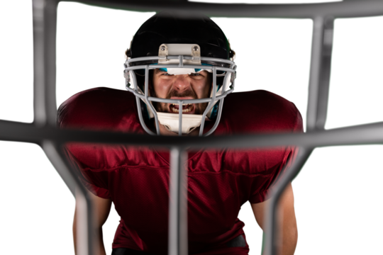 Digital png photo of angry caucasian male american football player on transparent background