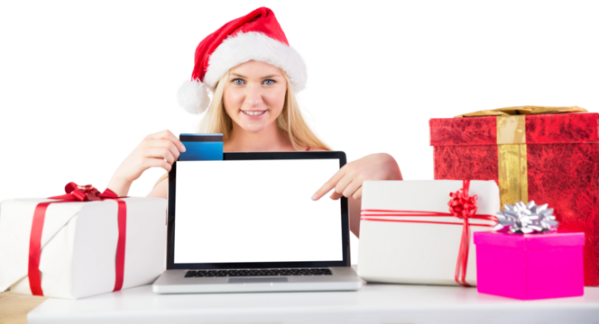 Digital png photo of caucasian woman in santa hat, laptop and credit card on transparent background
