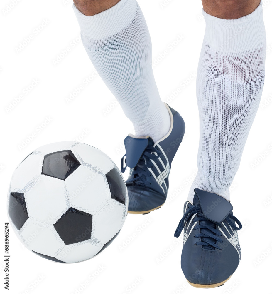 Wall mural Digital png photo of legs of caucasian male footballer with ball on transparent background