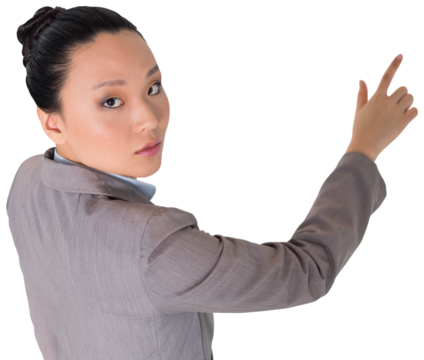 Digital png photo of asian businesswoman pointing on transparent background