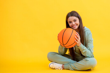 Passionate about basketball sport. Teen sport girl. Teen girl love the sport game of basketball....