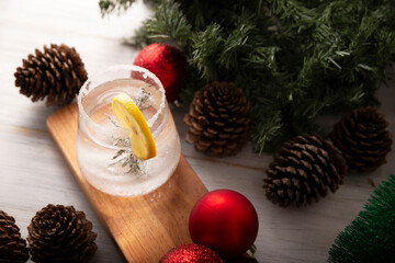 Snow Globe Cocktail. Christmas drink, creative festive beverage in drink glass decorated with...