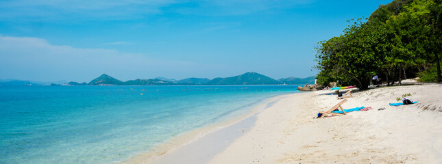 a tropical beach at Ko Kham Island Sattahip Chonburi Samaesan Thailand, a tropical island with turqouse colored ocen