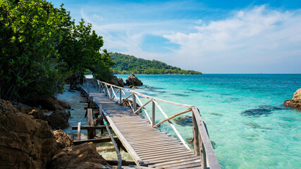 wooden pier jetty at Ko Kham Island Sattahip Chonburi Samaesan Thailand a tropical island with...