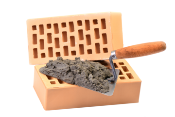 Trowel and bricks on white isolated