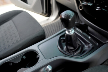 Gear lever of a black manual transmission of a car with 6 speed, pickup truck, automotive parts...