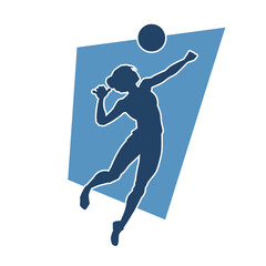 Silhouette of a female volley athlete in action pose. Silhouette of a woman playing volley ball sport.