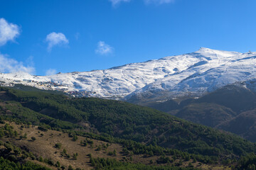 Fototapeta na wymiar slopes of Pradollano ski resort in Sierra Nevada mountains in Spain