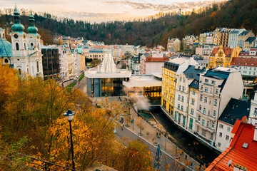 Panoramic view of Karlovy Vary in autumn, colored houses - obrazy, fototapety, plakaty