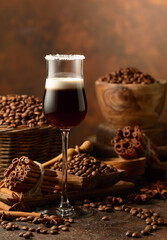Coffee liqueur with cream on a brown background.