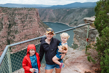Casual family portrait at Red Canyon overlook of Flaming Gorge