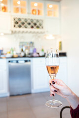 Woman's Hand holding Glass of Champagne