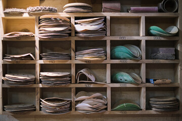 Organized abrasives in a workshop, casting soft shadows; a nod to craftsmanship in the age of mass...