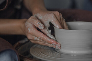 ceramics workshop hands in clay