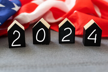 United States presidential election 2024. Wooden cubes with the letters 2024 on the American flag...