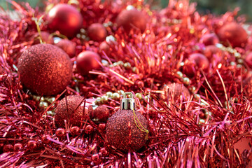 Christmas background of shiny red balls and tinsel