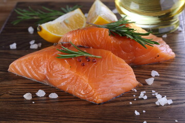 Salmon fillet on wooden background