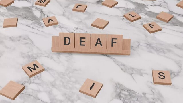 Deaf word written on scrabble