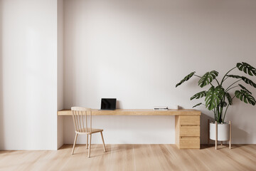 White home office interior with laptop