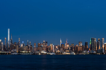 Fototapeta premium New York west side and panoramic view on office buildings at night
