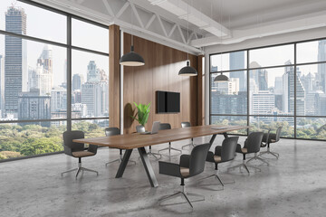 Stylish office room interior with meeting table and seats, panoramic window