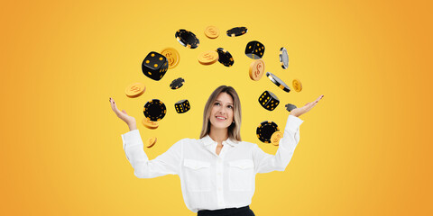 Smiling woman with open hand palms, money coins and dice falling