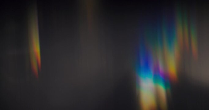 Luminous aura of our Spectrum Light Flare Overlay. Against a black canvas, the rainbow flares emanate a radiant and captivating aura, enveloping the scene in a magical and captivating glow.